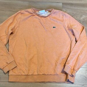 Lacoste sport women’s peach crewneck hoodie size 44   Has some ink stains and st